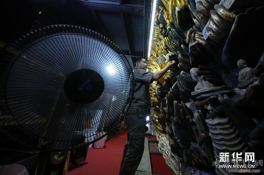 #（文化）（2）持續(xù)陰雨阻礙重慶大足千手觀音造像修復(fù)工作