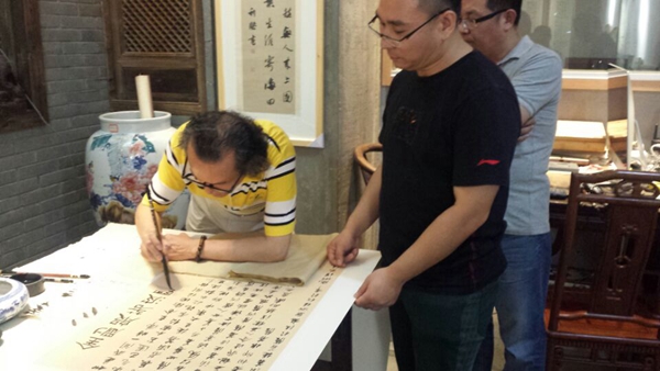 徐利明為作品題款