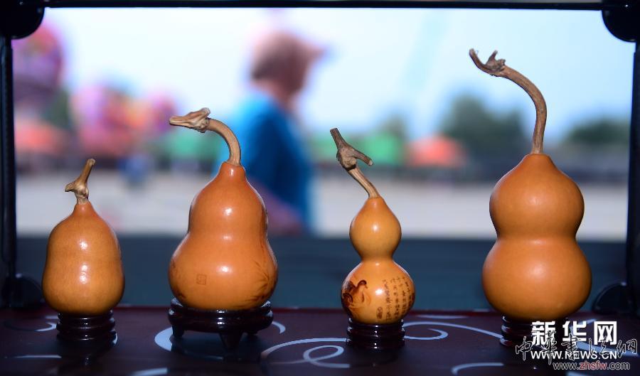 葫蘆工藝品匯聚葫蘆島葫蘆節(jié) 圖 (晚報)(1)葫蘆工藝品匯聚葫蘆島葫蘆節(jié)