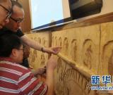 專家成功修復(fù)湖南宋代精美獸面人身彩色壁畫