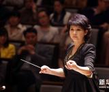 一聲已動(dòng)物皆靜、四座無言星欲稀--走近《“錦城絲管”大型民族交響音樂會(huì)》指揮丁曉燕