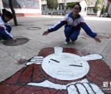 “井蓋畫”扮靚校園 圖