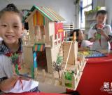 小學(xué)生“變廢為寶”迎世界環(huán)境日 組圖