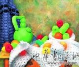 美國街頭賣藝的魔術(shù)師將名畫變氣球