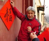 送“?！边M(jìn)家門(mén)