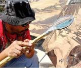 放大鏡作畫(huà)筆太陽(yáng)光當(dāng)顏料