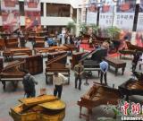 深圳百年經(jīng)典鋼琴藝術(shù)展同時展出60臺古鋼琴