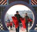 送“?！边M萬家